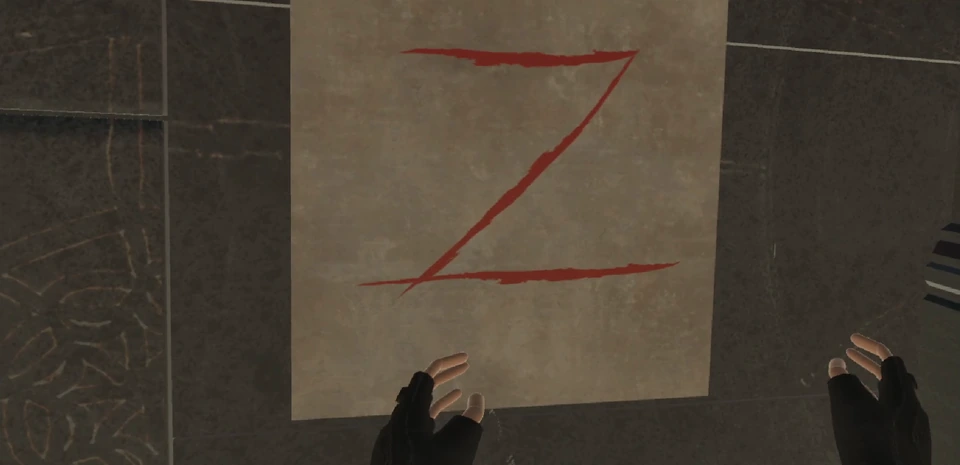 Gloved hands beneath the completed red Z in the Unity VR prototype.